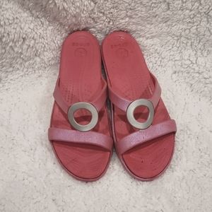 Women's pink Crocs sandals with silver ring size 7